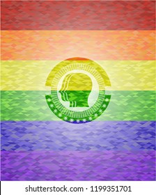 team work icon on mosaic background with the colors of the LGBT flag