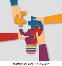 Team work symbol in different colors   - Shutterstock ID 1702266394