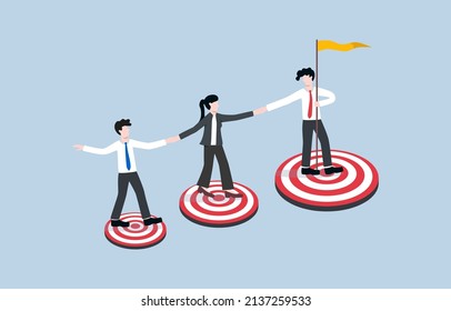 Teamwork achieves targets together from small to large projects. Collaboration and team development concept. Employees held hands together and walked up increasing size targets.
