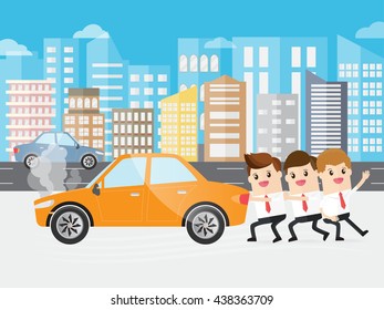 teamwork of businessman pushing broken down car