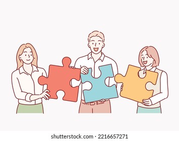 Teamwork and collaboration concept with four diverse multiracial people with puzzle pieces trying to find a solution together. Hand drawn style vector design illustrations.