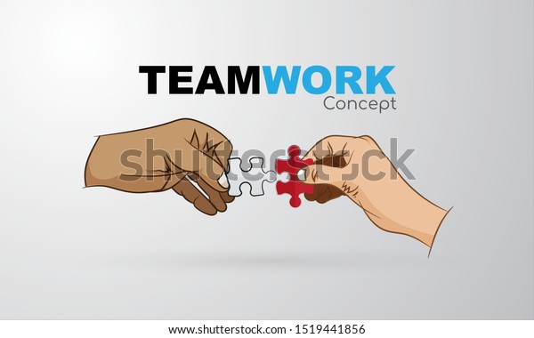 Teamwork concept hand holds puzzle pieces.\
Divides the task to strive\
successful.