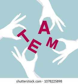 Teamwork concept, holding letters, forming "TEAM"