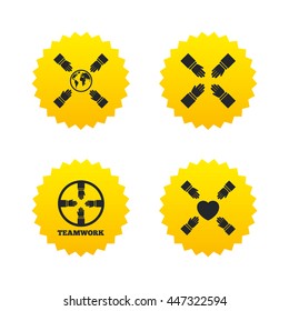 Teamwork icons. Helping Hands with globe and heart symbols. Group of employees working together. Yellow stars labels with flat icons. Vector