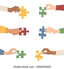 Teamwork. Multi-ethnic group holding puzzles. The concept of cooperation and partnership. Flat style. Vector illustration