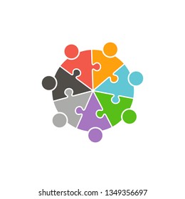 Teamwork people circle in puzzle pieces Logo