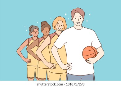 Teamwork, sport, basketball, portrait concept. Team of young happy smiling multiethnic women girls students teenagers players atheltes standing together with man guy coach character looking at camera.