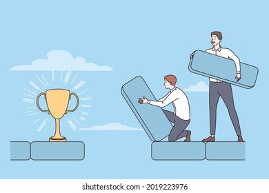 Teamwork, success, achieving goal concept. Two young smiling positive businessmen coworkers making route to golden trophy together as team vector illustration 