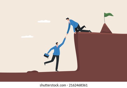 Teamwork support.
Working together to achieve goals, cooperation.
A business man helping an employee climb a steep cliff by hand.
