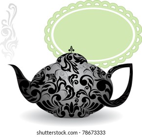 teapot with a beautiful ornament and clouds of steam