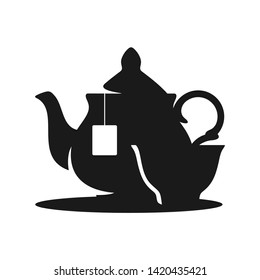 Teapot and cup black and white on a white background in vector EPS8