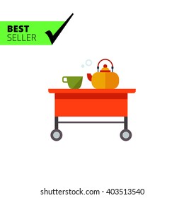 Teapot and cup on tea-trolley