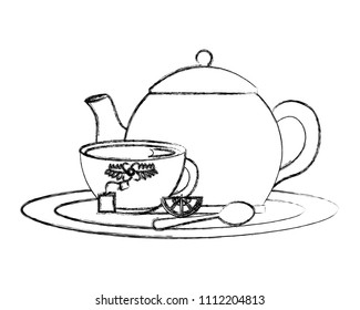 teapot and cup spoon lemon slice tea bag on tray
