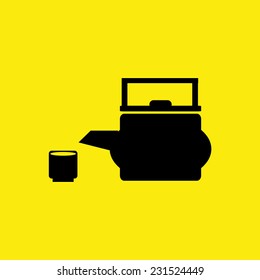 Teapot and cup. Vector silhouettes on a white background. 