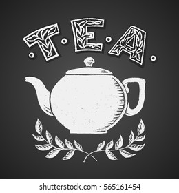 Teapot drawn on chalkboard with Tea lettering