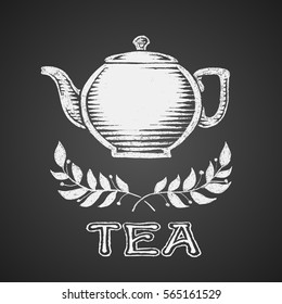 Teapot drawn on chalkboard with Tea lettering