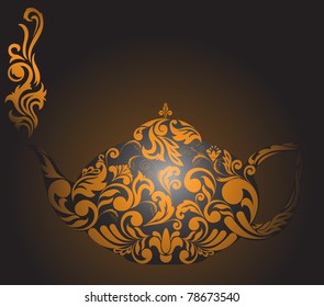 teapot with golden ornament and clouds of steam