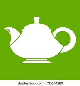 Teapot icon white isolated on green background. Vector illustration