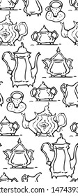 Teapot And Teacups drawing made in funny cartoon style. Seamless pattern.