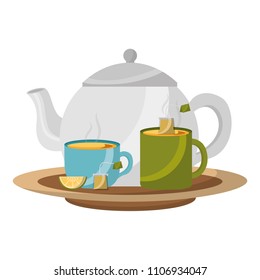teapot and teacups teabag lemon slice on dish