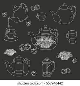 Teapots and cups of herbal tea