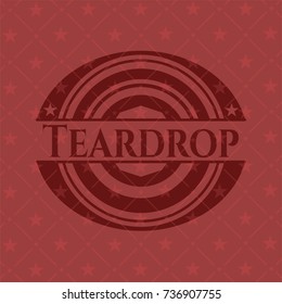 Teardrop badge with red background