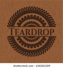 Teardrop badge with wood background