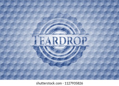 Teardrop blue emblem or badge with abstract geometric pattern background.