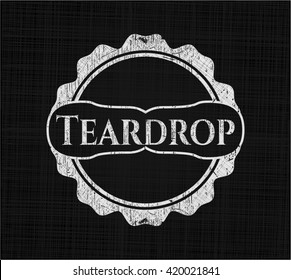 Teardrop chalkboard emblem on black board