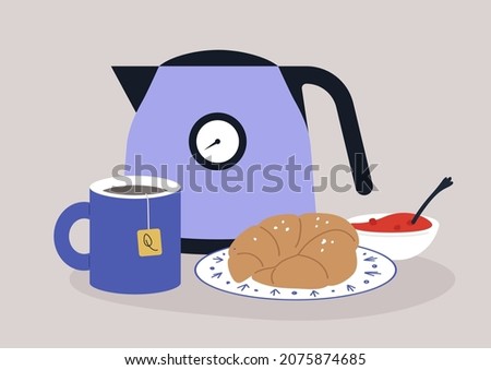 Tea-time set, a kettle, a mug with a teabag brewing in it, a croissant, and a bowl of strawberry jam