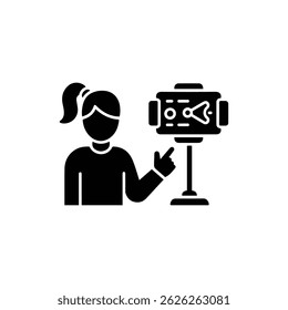 Tech Influencer Presenting Gadget on Stand Black Icon