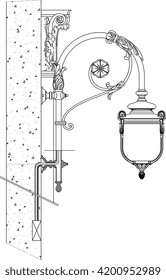 Technical CAD elevation of an ornate, vintage-style wall-mounted lantern featuring a scrolled bracket, decorative backplate, and surface-mounted conduit.