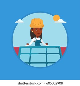 Technician installing solar panels on roof. Technician in hard hat checking solar panel on roof. Technician adjusting solar panel. Vector flat design illustration in the circle isolated on background.