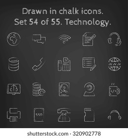 Technology icon set hand drawn in chalk on a blackboard vector white icons on a black background.