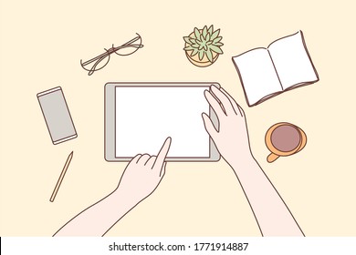 Technology, mobile, media, business concept. Human character hands using tablet in office for work or social network communication or watching videos. Digital technological devices in daily life.