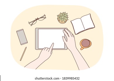 Technology, mobile, social media, business concept. Human character designer hands using blank tablet in office workplace for jub web network communication. Digital technological gadgets in daily life