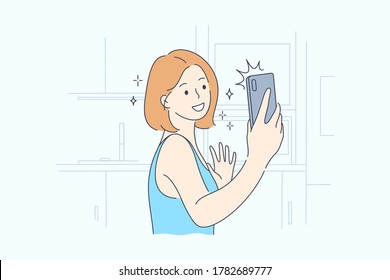 Technology, selfie, lifestyle, social media, mobile concept. Young happy smiling woman girl cartoon character in great mood taking picture. Making selfie on smartphone in kitchen for social network.