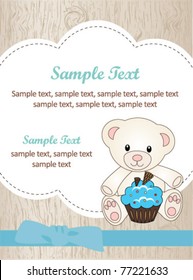 Teddy bear with blue cupcake