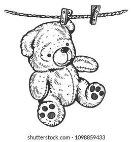 Teddy bear drying on rope engraving vector illustration. Scratch board style imitation. Black and white hand drawn image.