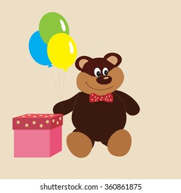 Teddy bear with gift and balls