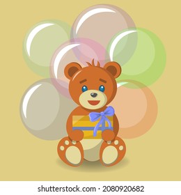 Teddy bear with a gift on the background of balloons.