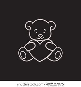 Teddy bear with heart vector sketch icon isolated on background. Hand drawn Teddy bear with heart icon. Teddy bear with heart sketch icon for infographic, website or app.