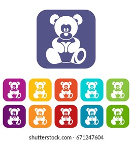 Teddy bear holding a heart icons set vector illustration in flat style In colors red, blue, green and other