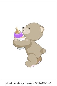 The teddy bear holds a small bottle with milk in hand