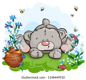 Teddy bear lies on a clearing with a pot of honey. Background nature