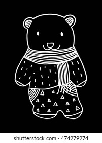 teddy bear with scarf on black and white
