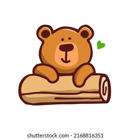 Teddy bear sits on a log