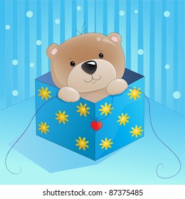 teddy bear sitting in the gift box