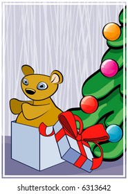 Teddy bear under Christmas tree
