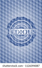 Tedious blue badge with geometric pattern background.